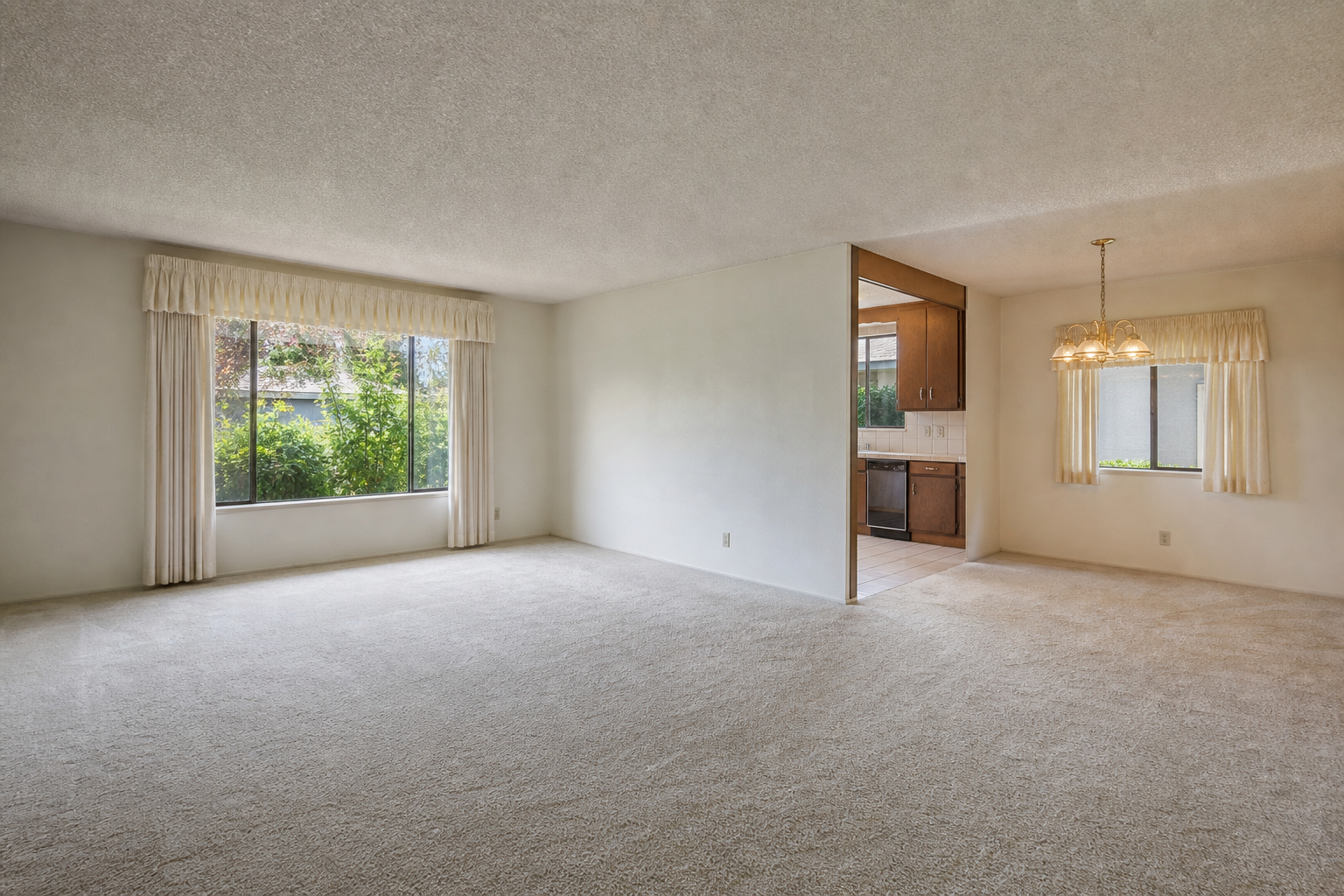 Before whole-home remodel with divided rooms and older layout
